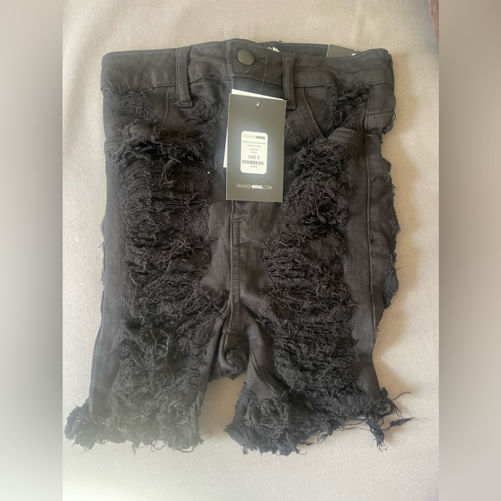 Black fashion nova ripped mid shorts